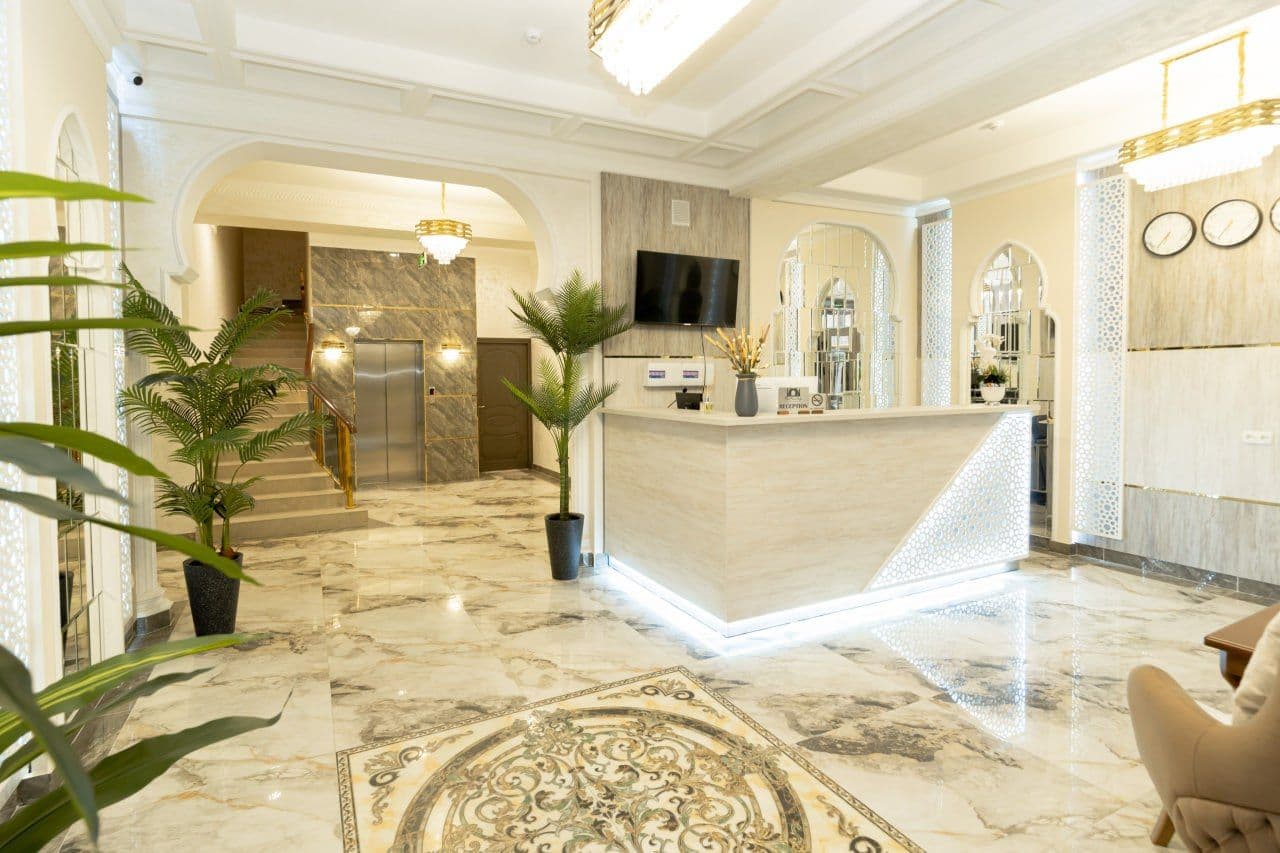 The Heritage Tashkent lobby with arched niches and marble reception